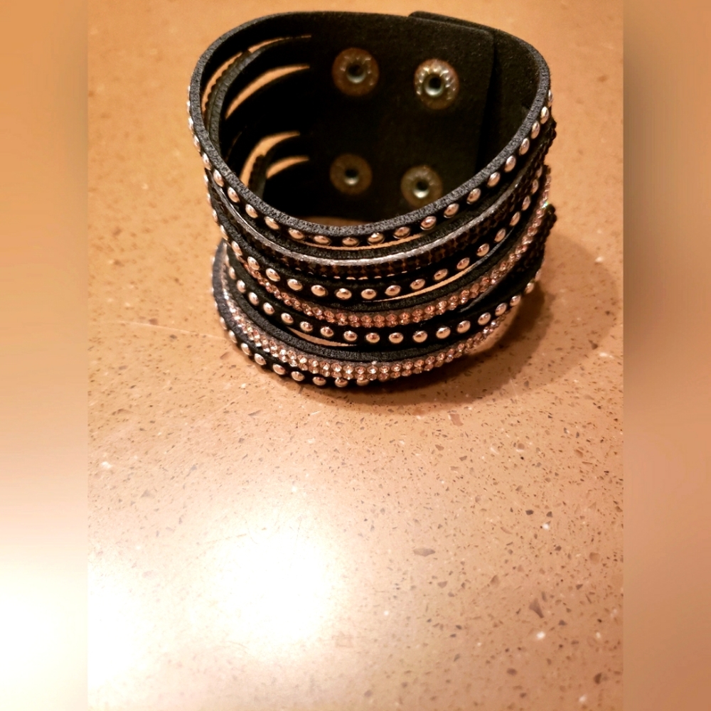 Black bracelet with sets & studs